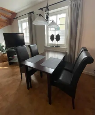 Ein Sitzbereich in der Unterkunft Ferienwohnung Keil