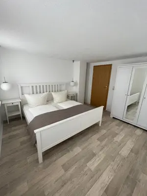 Ein Bett oder Betten in einem Zimmer der Unterkunft Ferienwohnung Keil