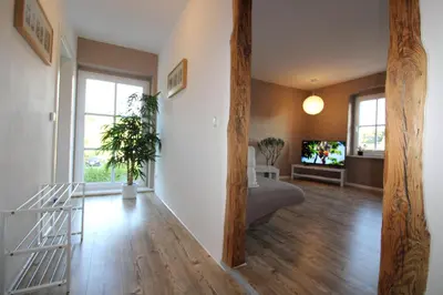 Ein Sitzbereich in der Unterkunft Ferienwohnung in herrlicher Teichlandschaft
