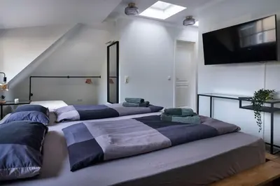 Ein Bett oder Betten in einem Zimmer der Unterkunft Privates ruhiges Haus im Herzen der Neustadt