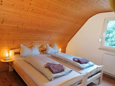 Ein Bett oder Betten in einem Zimmer der Unterkunft Käthes Sommerhaus
