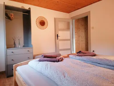 Ein Bett oder Betten in einem Zimmer der Unterkunft Käthes Sommerhaus