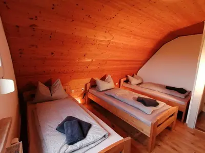 Ein Bett oder Betten in einem Zimmer der Unterkunft Käthes Sommerhaus