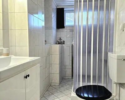 Ein Badezimmer in der Unterkunft Ferienwohnung in der Siedlung