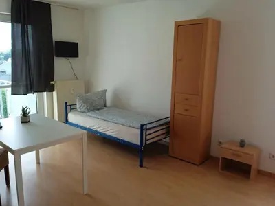 Ein Bett oder Betten in einem Zimmer der Unterkunft Apartments K11 für Monteure in Chemnitz