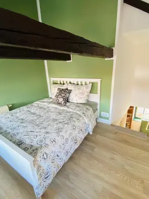 Ein Bett oder Betten in einem Zimmer der Unterkunft Am Engelserker - Ferienwohnungen in der Altstadt