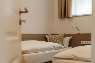 Ein Bett oder Betten in einem Zimmer der Unterkunft Elbresort Kurort Rathen
