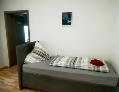 Ein Bett oder Betten in einem Zimmer der Unterkunft Ferienwohnung Axel - nahe Chemnitz