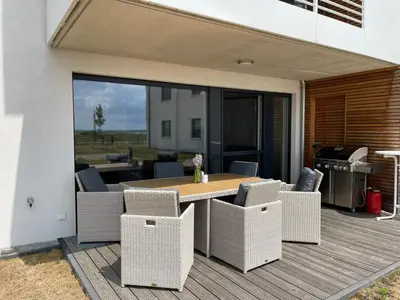 Ein Sitzbereich in der Unterkunft Exklusives Apartment mit Blick auf den See