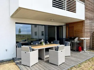 Ein Sitzbereich in der Unterkunft Exklusives Apartment mit Blick auf den See
