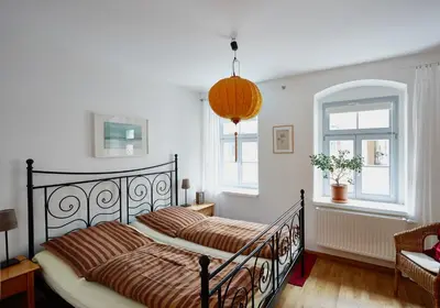 Ein Bett oder Betten in einem Zimmer der Unterkunft Ferienwohnung Prießnitz