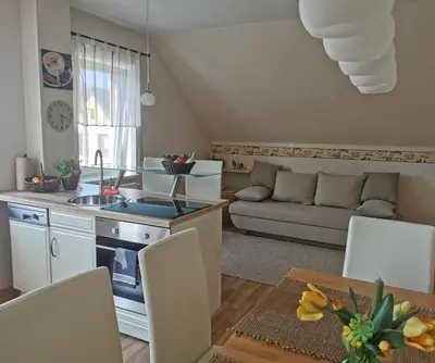 Ein Sitzbereich in der Unterkunft Ferienwohnung am Zschopautal - mit Saunabereich