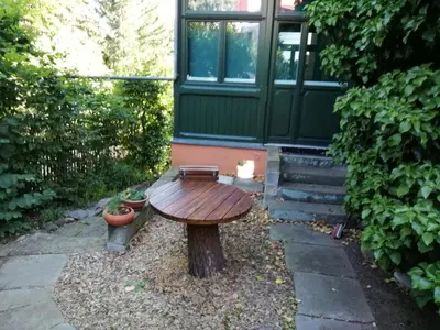 Ein Garten an der Unterkunft Ferienwohnung mit Charme in Dresden Pillnitz EG
