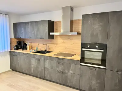 Küche/Küchenzeile in der Unterkunft Stadtquartier Wittichenau mit Sauna