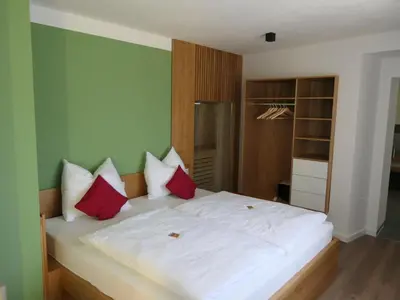 Ein Bett oder Betten in einem Zimmer der Unterkunft Fewo Gartenidylle