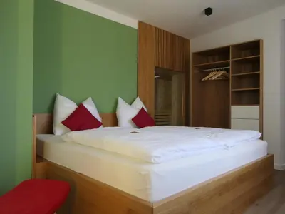 Ein Bett oder Betten in einem Zimmer der Unterkunft Fewo Gartenidylle