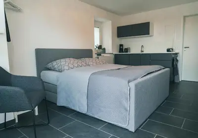 Ein Bett oder Betten in einem Zimmer der Unterkunft Apartment Haus Inge