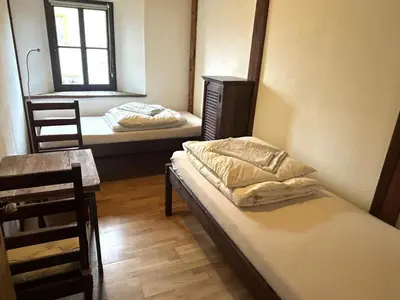 Ein Bett oder Betten in einem Zimmer der Unterkunft Laternenstube