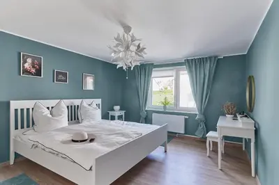 Ein Bett oder Betten in einem Zimmer der Unterkunft Ferienhaus Lichtblick