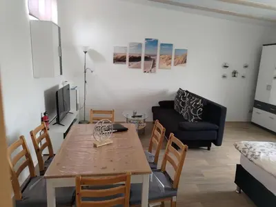 Ein Sitzbereich in der Unterkunft Ferienwohnung am See