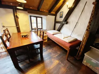 Ein Bett oder Betten in einem Zimmer der Unterkunft Fewo NAMIBIA-LODGE im Rittergut Leppersdorf bei Dresden