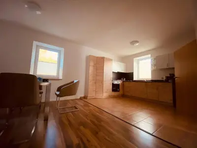 Ein Sitzbereich in der Unterkunft Ferienwohnung Nennigmühle