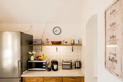 Küche/Küchenzeile in der Unterkunft Waldblickwohnung mit Gartensauna und Kamin