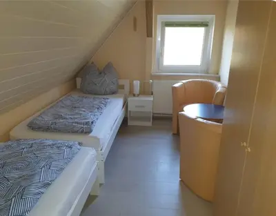 Ein Bett oder Betten in einem Zimmer der Unterkunft Fewo-hierundjetzt Lichtenhain bei Sebnitz am Malerweg