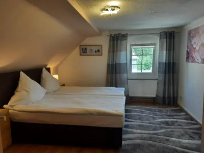 Ein Bett oder Betten in einem Zimmer der Unterkunft Haus Rauschenbach