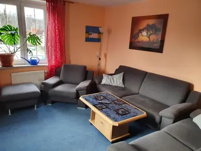 Ein Sitzbereich in der Unterkunft Apartment mit Balkon