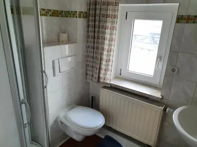 Ein Badezimmer in der Unterkunft Apartment mit Balkon