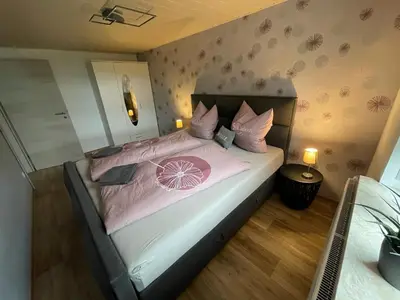 Ein Bett oder Betten in einem Zimmer der Unterkunft Ferienwohnung Sonnenhof