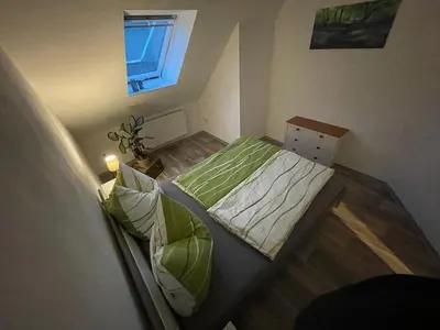 Ein Bett oder Betten in einem Zimmer der Unterkunft Ferienwohnung Sonnenhof