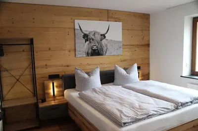 Ein Bett oder Betten in einem Zimmer der Unterkunft Ferienapartment Horn