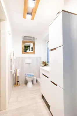 Ein Badezimmer in der Unterkunft Ferienwohnung ZUM WOHLFÜHLEN