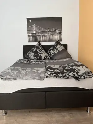 Ein Bett oder Betten in einem Zimmer der Unterkunft gemütliche kleine Ferienwohnung in Altenberg
