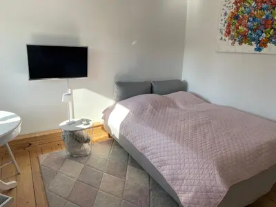 Ein Bett oder Betten in einem Zimmer der Unterkunft Apartment am HohenRand Dresden Leubnitz