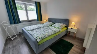 Ein Bett oder Betten in einem Zimmer der Unterkunft Fewo Böhle in Hainichen