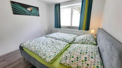 Ein Bett oder Betten in einem Zimmer der Unterkunft Fewo Böhle in Hainichen