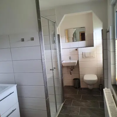 Ein Badezimmer in der Unterkunft Ferienhaus Willkommen