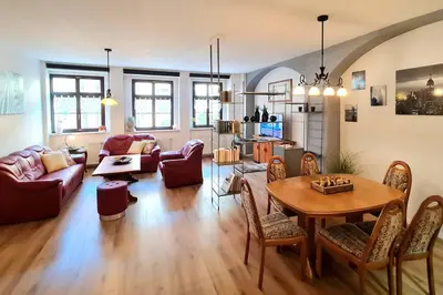Ein Sitzbereich in der Unterkunft NEU: Großzügige Citywohnung mit XXL Dachterrasse!
