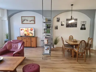 Ein Sitzbereich in der Unterkunft NEU: Großzügige Citywohnung mit XXL Dachterrasse!