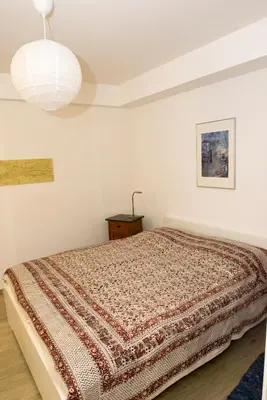 Ein Bett oder Betten in einem Zimmer der Unterkunft Striesener Idylle, ruhig und grün in Elbnähe