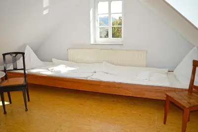 Ein Bett oder Betten in einem Zimmer der Unterkunft Burg Schöna