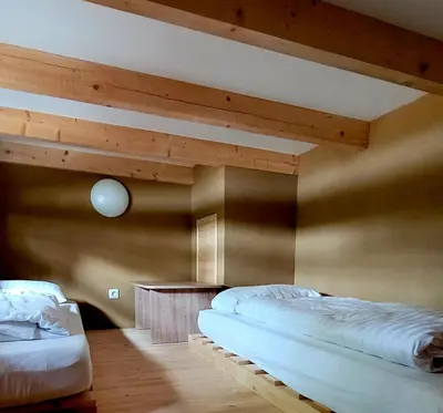 Ein Bett oder Betten in einem Zimmer der Unterkunft Naturcamping Brettmühlenteich