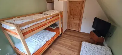 Ein Bett oder Betten in einem Zimmer der Unterkunft Ferienhaus Waldhäus'l