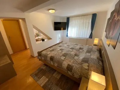 Ein Bett oder Betten in einem Zimmer der Unterkunft Hotel Bielatal