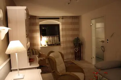 Ein Sitzbereich in der Unterkunft Romantik Landhaus