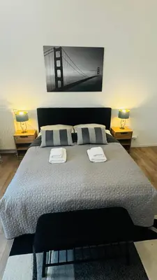Ein Bett oder Betten in einem Zimmer der Unterkunft Ferienwohnung Jurga