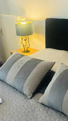 Ein Bett oder Betten in einem Zimmer der Unterkunft Ferienwohnung Jurga